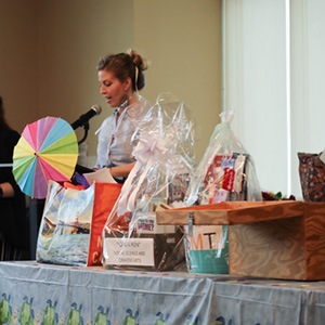 a raffle table with prizes at a celebratory event