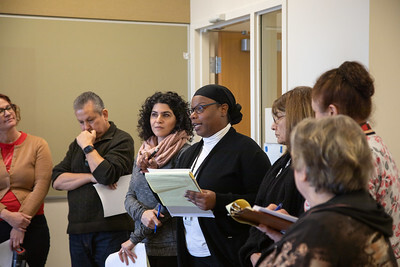 flex day woman speaking at podium