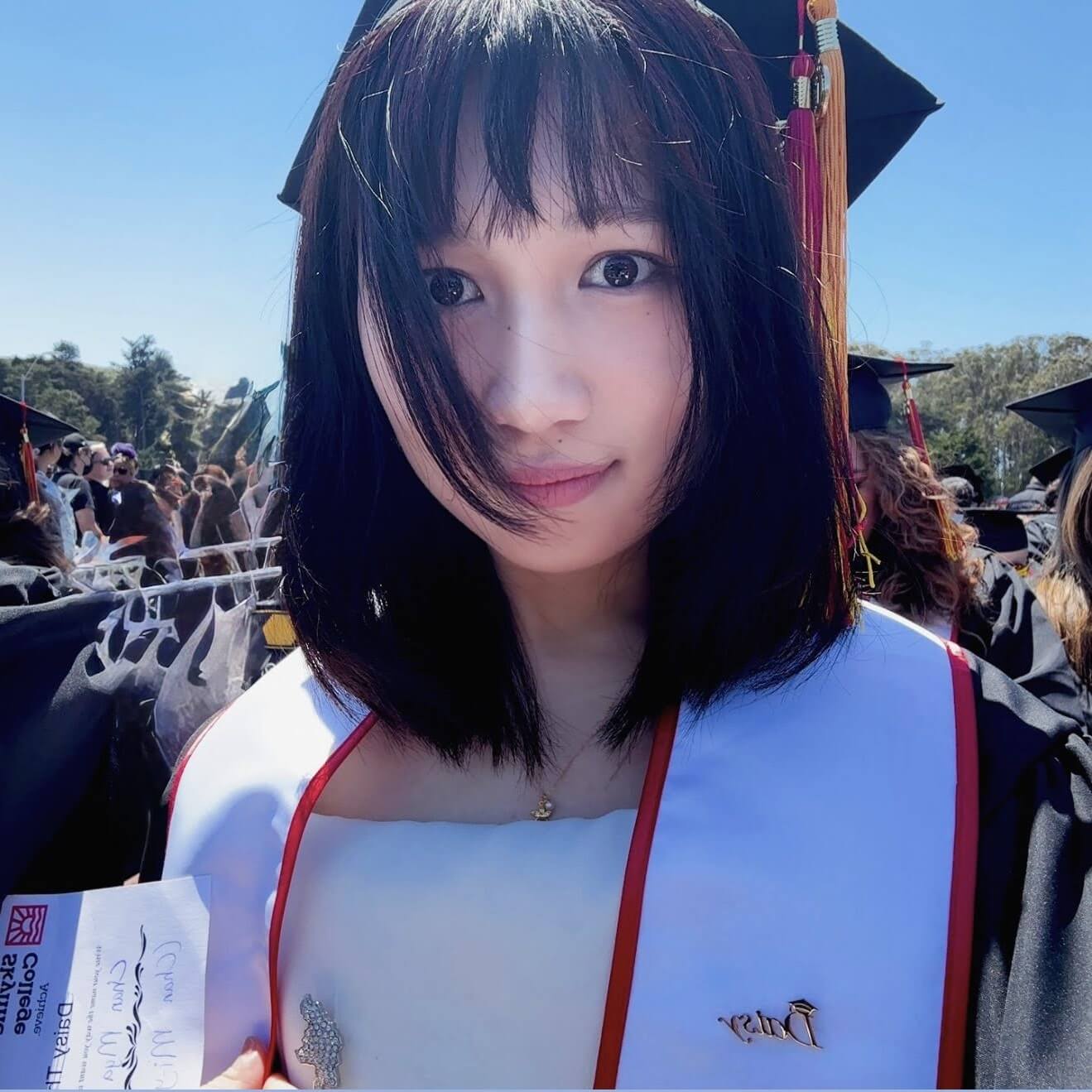 Chan Myae Thu takes a selfie in her graduation regalia at Skyline College commencement