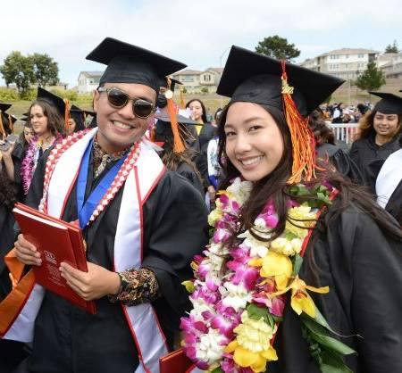 2 graduates of Promise Scholars at commencement