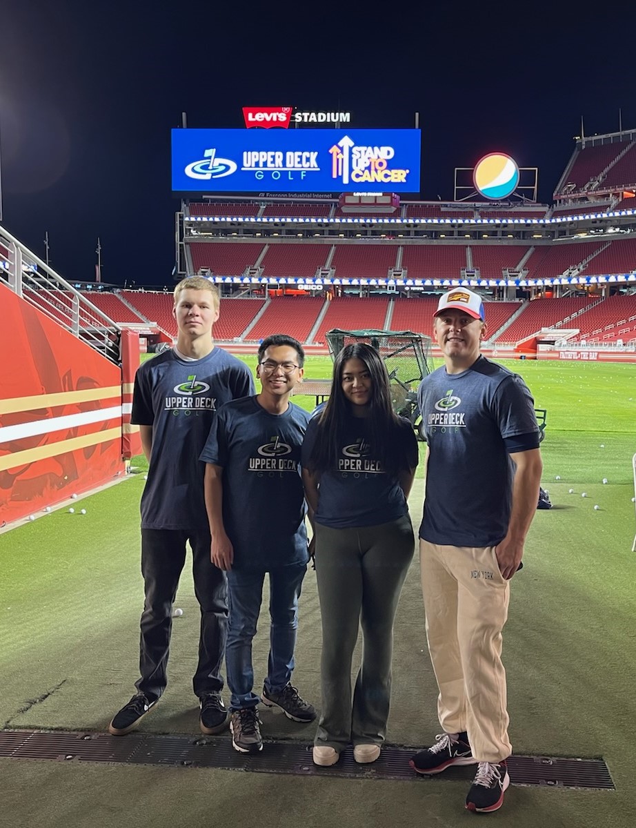 Three people standing at Levi Stadium