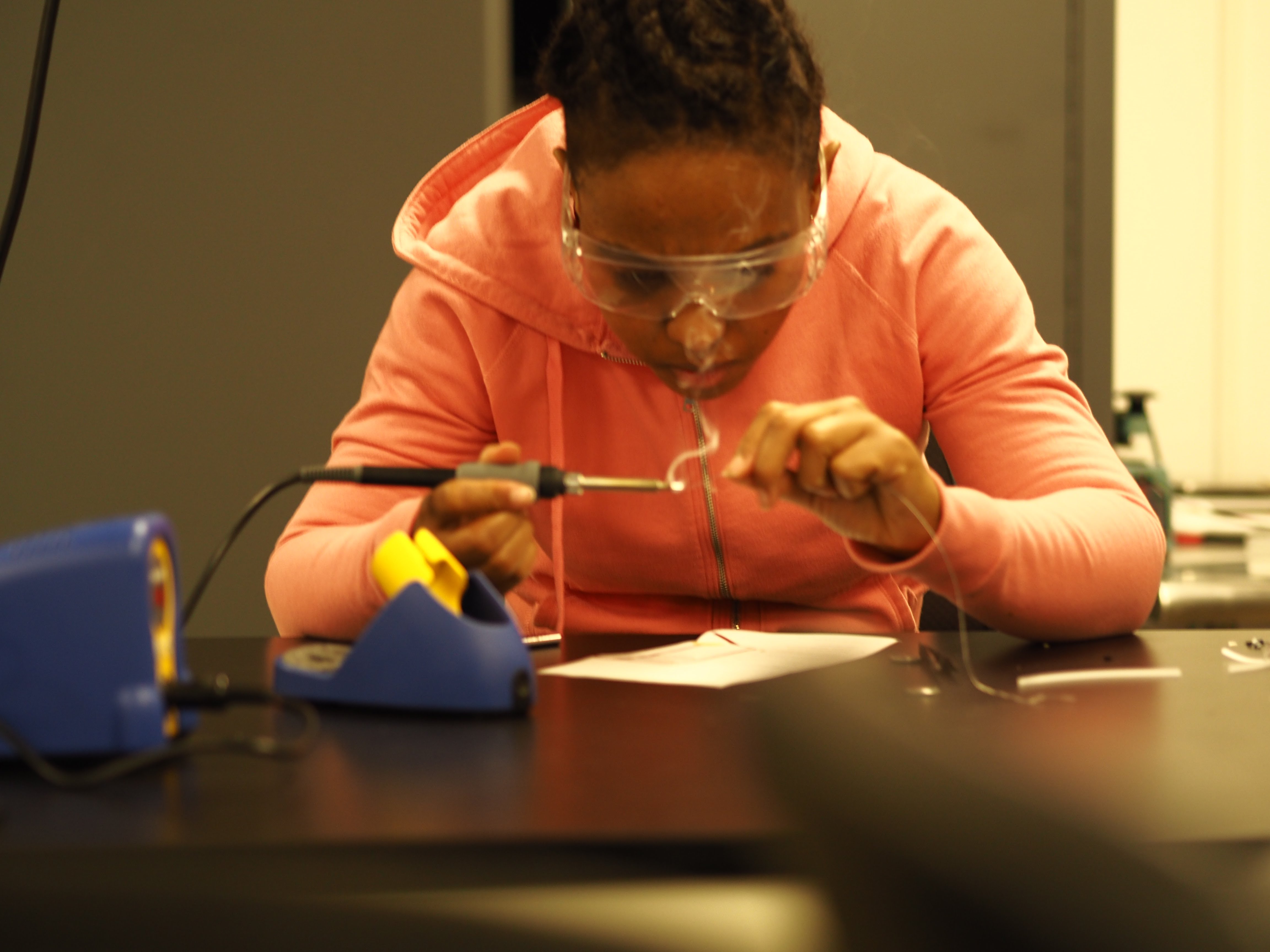 Student soldering a project