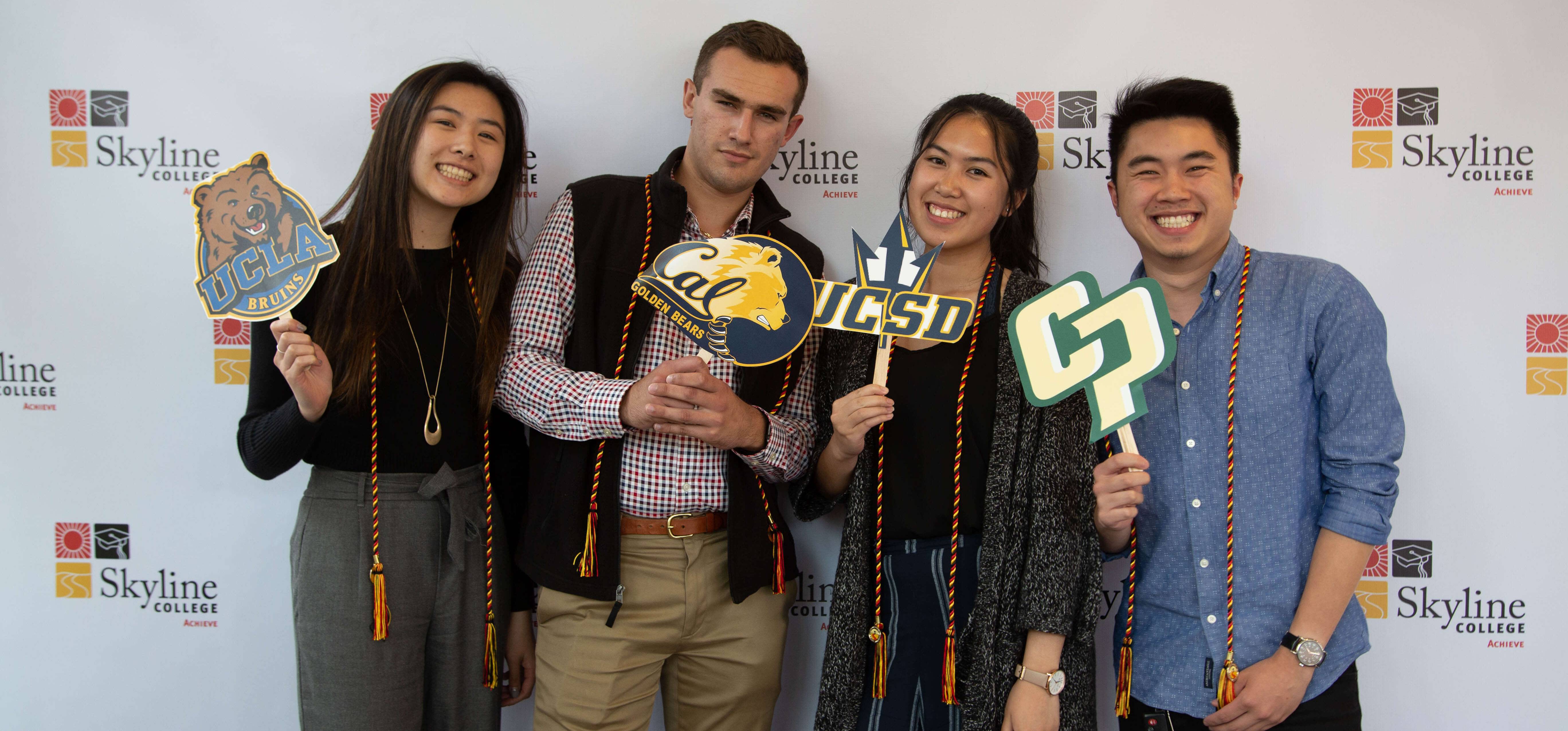 transfer students holding pennants